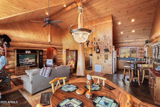 living room with ceiling fan with notable chandelier, washer / clothes dryer, high vaulted ceiling, and wooden ceiling