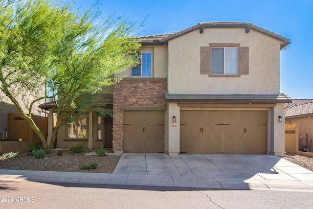 view of front of home featuring a garage