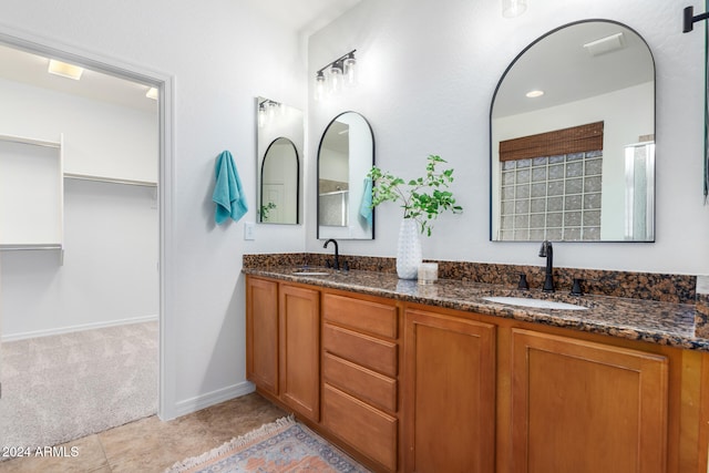 bathroom featuring vanity and tile patterned flooring