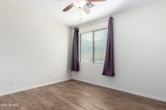 unfurnished room with hardwood / wood-style floors and ceiling fan