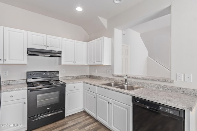 kitchen with light hardwood / wood-style floors, white cabinetry, sink, black appliances, and lofted ceiling