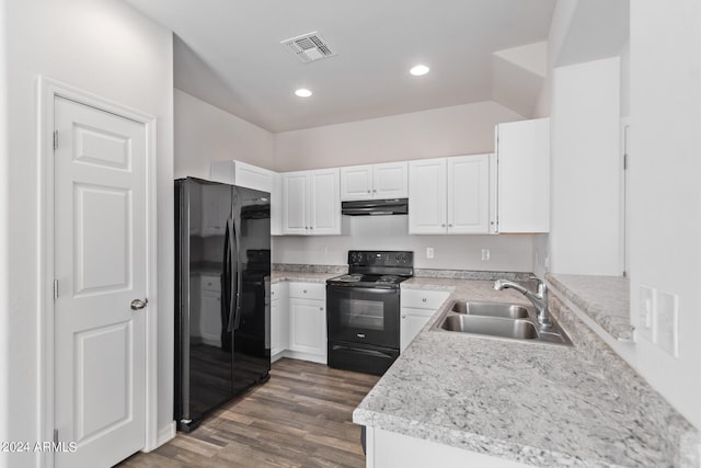 kitchen featuring white cabinets, sink, dark hardwood / wood-style flooring, and black appliances