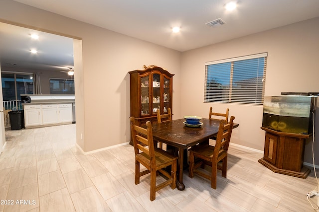 dining area with ceiling fan