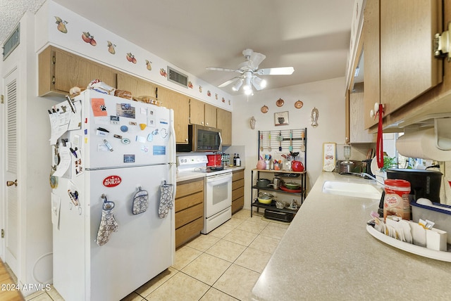 kitchen with light tile flooring, white appliances, ceiling fan, and sink