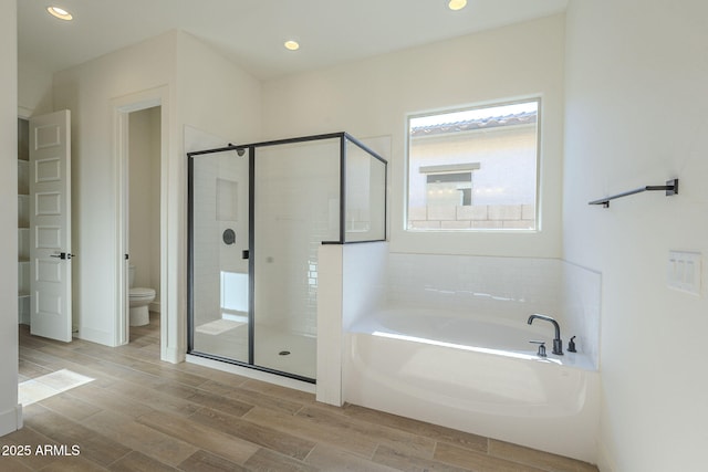 bathroom with plus walk in shower and toilet