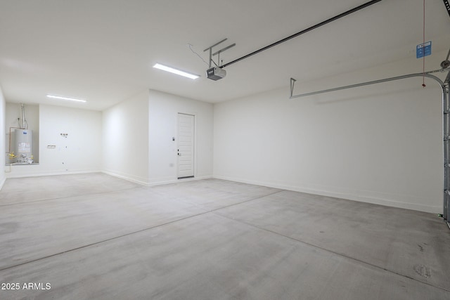 garage featuring a garage door opener and gas water heater