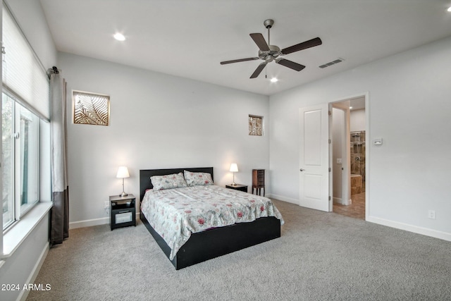 carpeted bedroom with ceiling fan