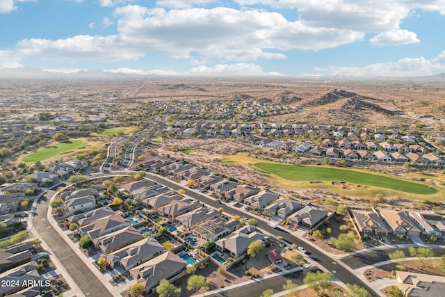 birds eye view of property with a mountain view