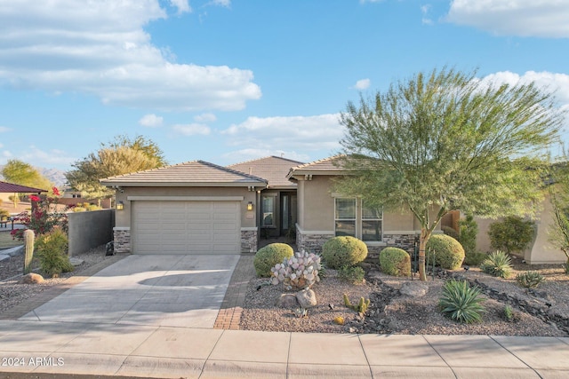 view of front of home with a garage