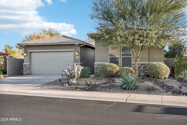 view of front of home with a garage