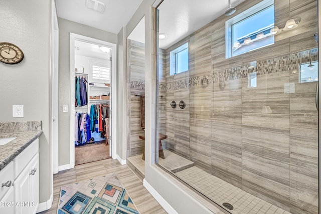 12932 W Cassia Trl, Peoria, AZ 85383 - full bath featuring a stall shower, vanity, and a spacious closet