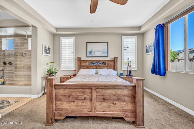 12932 W Cassia Trl, Peoria, AZ 85383 - bedroom with carpet floors, multiple windows, and ceiling fan