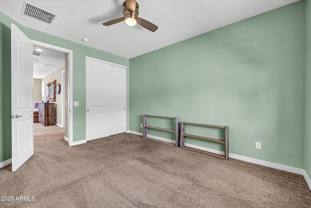12932 W Cassia Trl, Peoria, AZ 85383 - unfurnished bedroom with carpet flooring, a closet, and ceiling fan