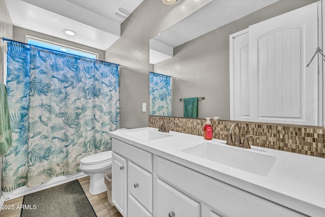 12932 W Cassia Trl, Peoria, AZ 85383 - bathroom with backsplash and double vanity