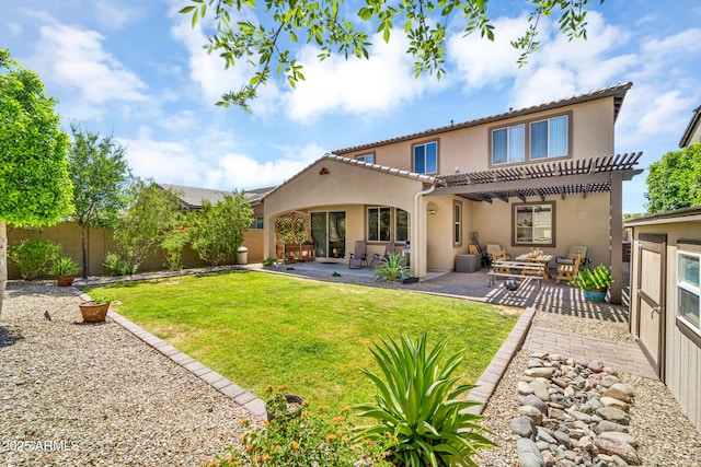 12932 W Cassia Trl, Peoria, AZ 85383 - back of house featuring stucco siding, an outdoor hangout area, a pergola, and a fenced backyard
