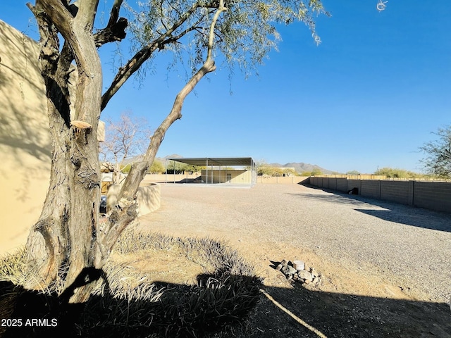 view of yard with a mountain view