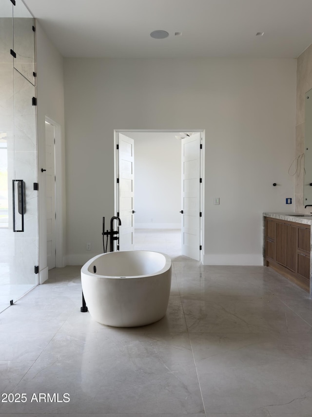 4644 E Indian Bend Rd, Paradise Valley, AZ 85253 - full bathroom featuring a soaking tub, vanity, and a stall shower