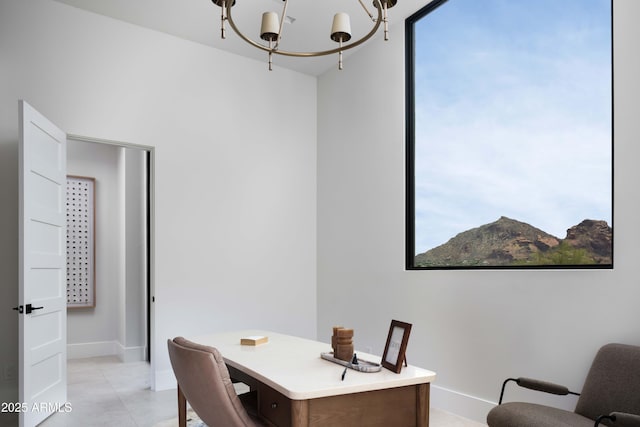4644 E Indian Bend Rd, Paradise Valley, AZ 85253 - dining room featuring a chandelier, a desk, and baseboards
