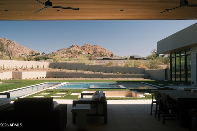4644 E Indian Bend Rd, Paradise Valley, AZ 85253 - view of swimming pool with a mountain view, a fenced backyard, a ceiling fan, and a patio area