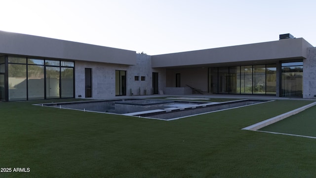 4644 E Indian Bend Rd, Paradise Valley, AZ 85253 - rear view of house featuring stucco siding and an outdoor pool