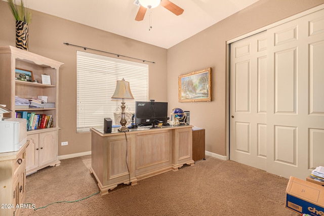 carpeted home office with ceiling fan