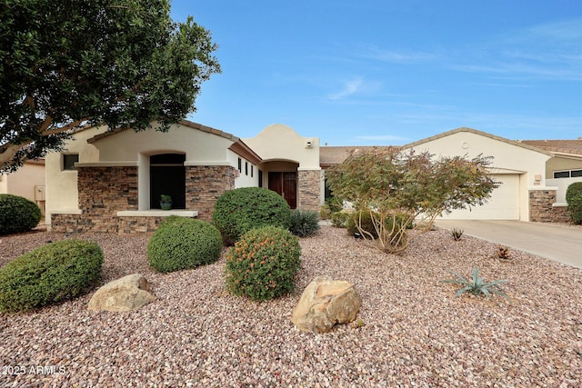 view of front of property featuring a garage