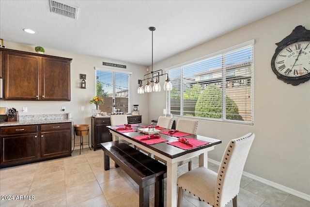 dining room with light tile patterned floors