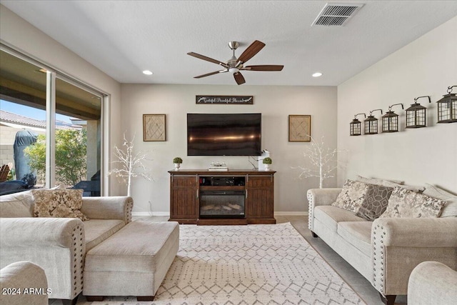 living room with ceiling fan