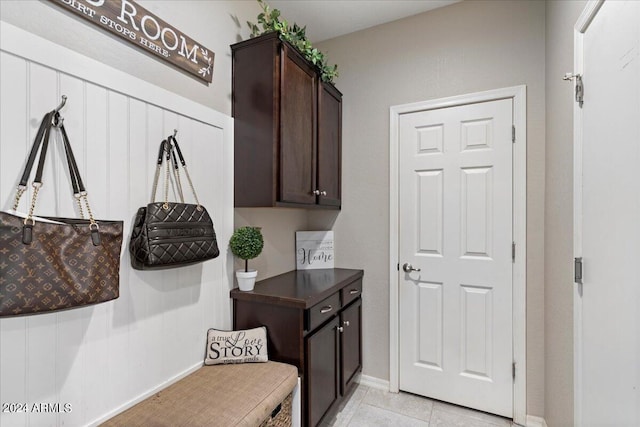 mudroom featuring light tile patterned floors