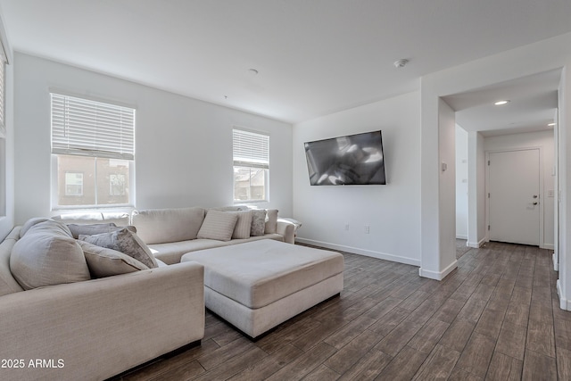 living room with dark wood-style floors and baseboards