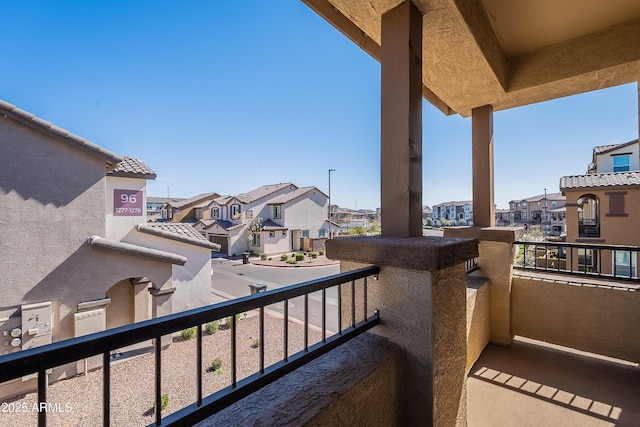 balcony featuring a residential view