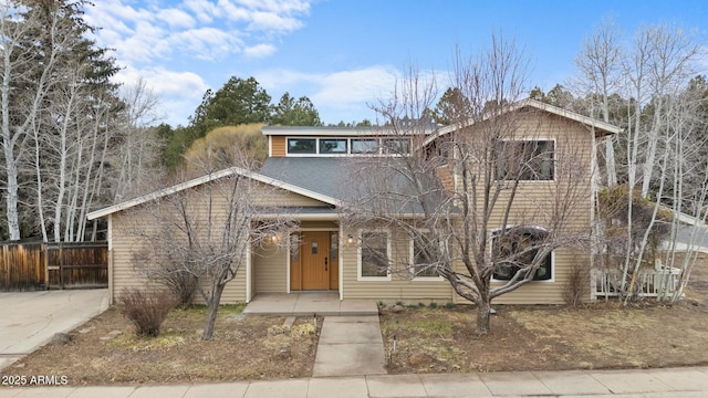 view of front of home with fence