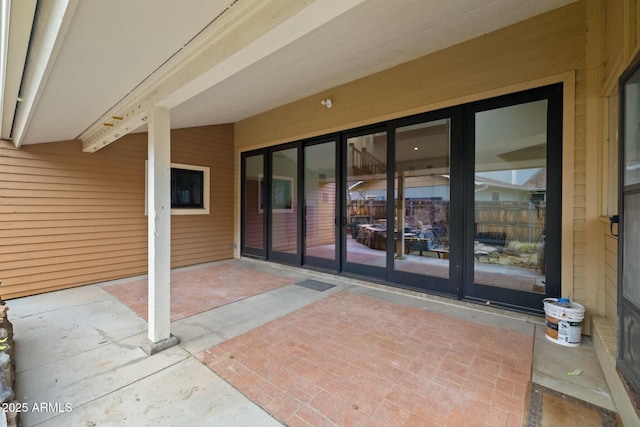 doorway to property featuring a patio