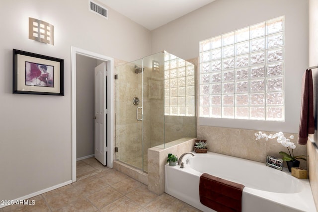22232 N 48th St, Phoenix, AZ 85054 - full bathroom with visible vents, a bath, a stall shower, and tile patterned floors