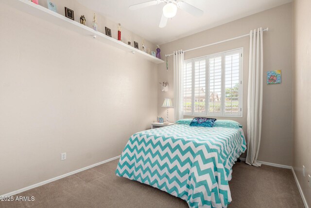 22232 N 48th St, Phoenix, AZ 85054 - bedroom with baseboards, carpet flooring, and ceiling fan