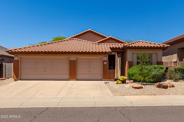 22232 N 48th St, Phoenix, AZ 85054 - view of front facade featuring a tile roof, an attached garage, driveway, and stucco siding