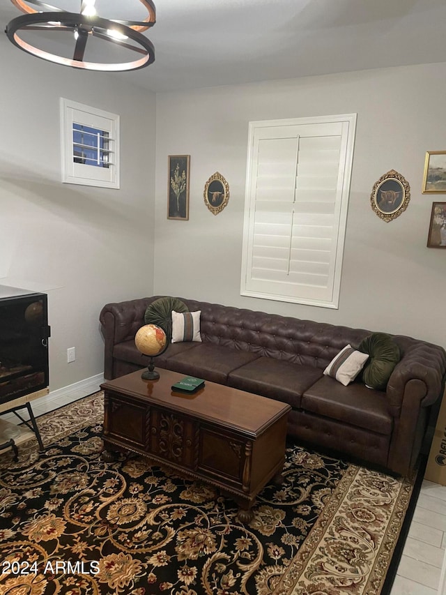 living room with an inviting chandelier