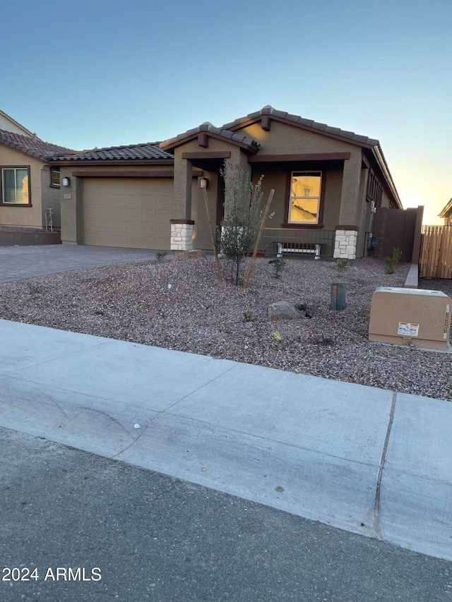 view of front of home with a garage