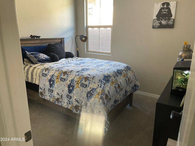 bedroom featuring carpet