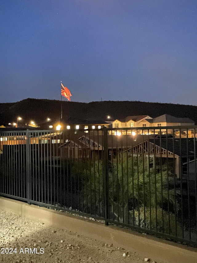 view of gate at dusk