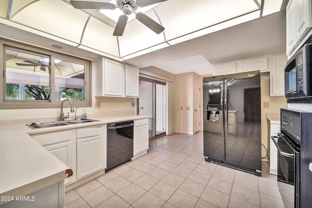 kitchen featuring ceiling fan, white cabinets, sink, and black appliances