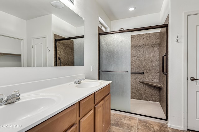 bathroom featuring vanity and walk in shower