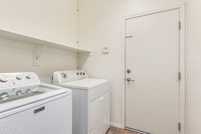 laundry room with washer and clothes dryer