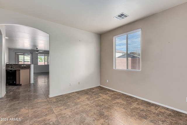 spare room featuring ceiling fan