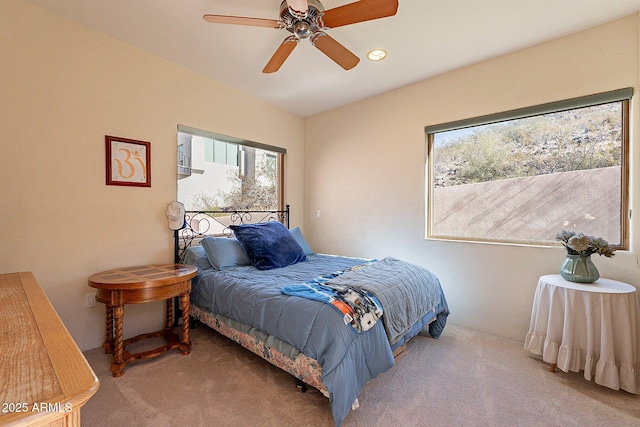 carpeted bedroom with ceiling fan