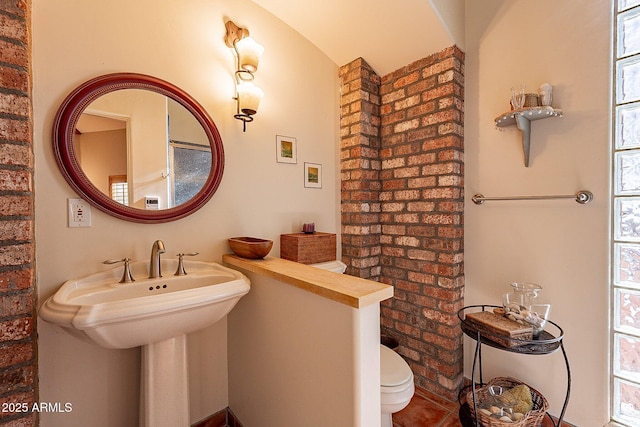 bathroom with sink and toilet