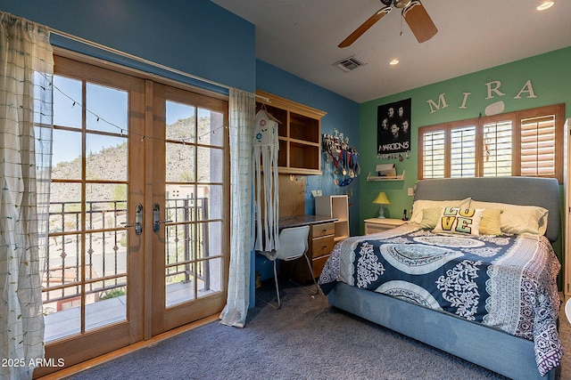 bedroom featuring french doors, ceiling fan, multiple windows, and access to outside