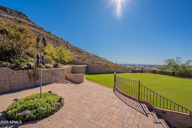 view of patio / terrace featuring a mountain view