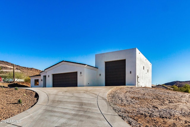 view of front of property with a mountain view