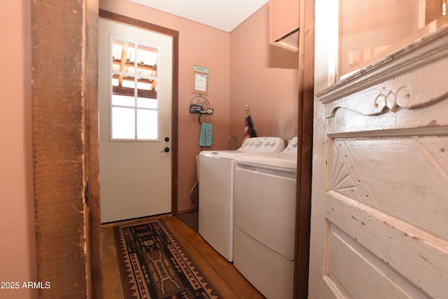 washroom featuring washer and clothes dryer and laundry area